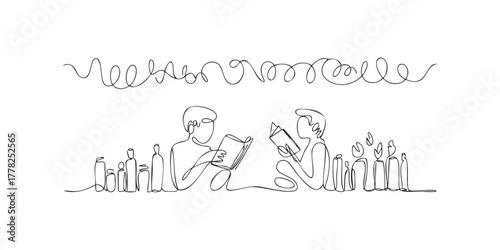 Two people read books next to illuminated candles