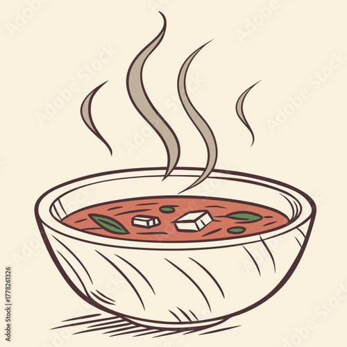 Bowl of hot soup with steam