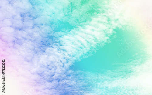 Beautiful multi-colored pastel background and light flare.
