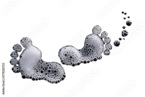 Two foamy footprints on a black background