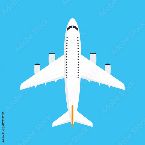 Overhead view of a white passenger airplane against a bright blue background.