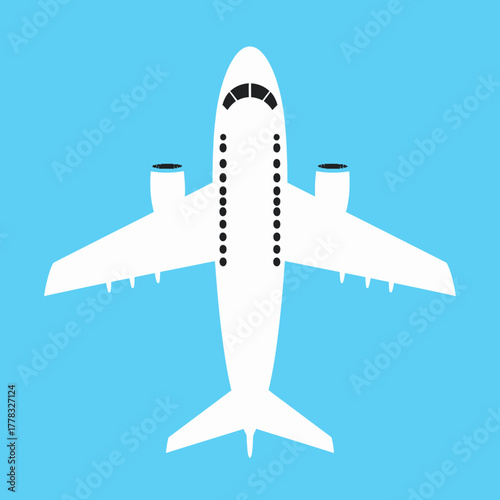 Overhead view of a white passenger airplane with wings, engines, and seating arrangement.