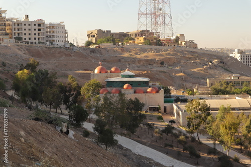 Aleppo, Syria.
Mosque with unique domes and Middle Eastern architecture. The peaceful scene reflects cultural diversity, unity, and faith in a city rebuilding after years of conflict.