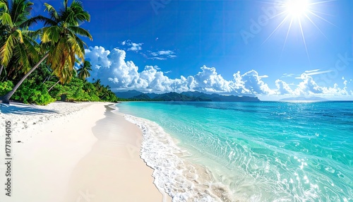 Fototapeta Naklejka Na Ścianę i Meble -  Overhead drone view of a lush green tropical island with palm trees white sand beach clear turquoise ocean and visible coral reef under bright sunlight