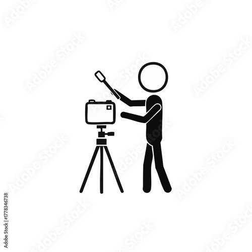 A black and white vector illustration depicts a person filming with a camera on a tripod, holding a microphone, ready to record.