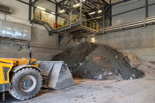 Heavy machinery at waste incineration site