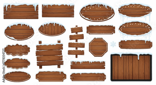 Set of assorted rustic wooden signs and signboards with snow caps and icicles, isolated for winter holiday design