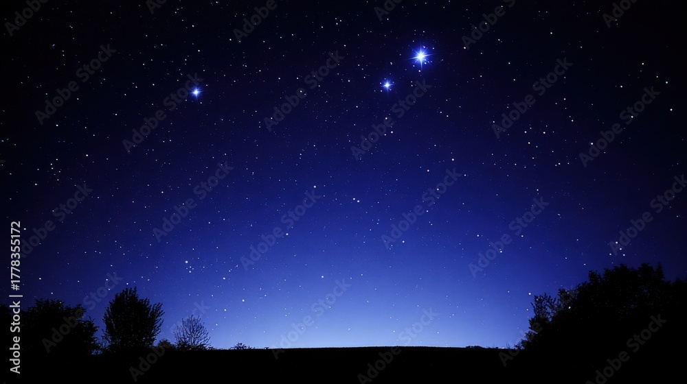 Fototapeta premium Stunning Starry Night Sky Over Horizon Landscape: Tranquil, Dark, and Majestic Scenery
