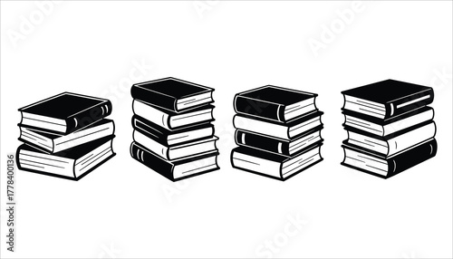Four stacks of black and white hardcover books on a white background pile reading