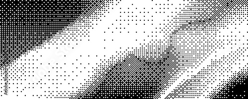 abstract pixelated gradient pattern in black and white with scattered squares