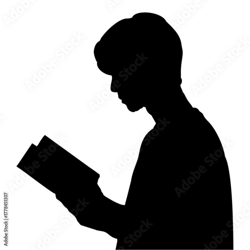 silhouette of a person reading a book
