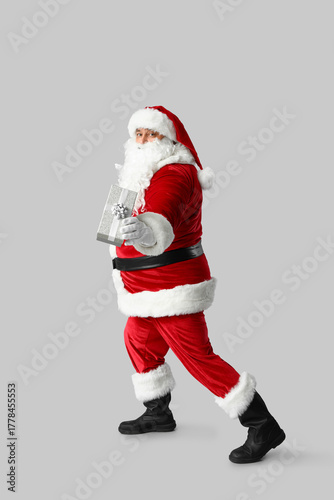 Dancing Santa Claus with gi...