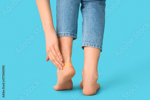 Young woman applying callus...