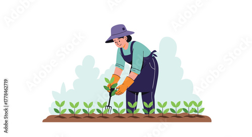 A cheerful woman gardener in a hat and apron, wearing gloves, diligently cultivates a row of young green plants in a garden with a hand tool.