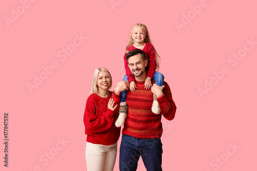 Happy couple with daughter ...