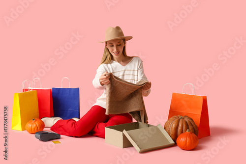 Young woman in autumn cloth...