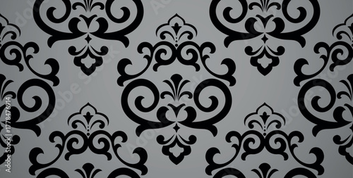 Wallpaper in the style of Baroque. Gray and black floral ornament. Seamless vector background. Graphic pattern for fabric, wallpaper, packaging. Ornate Damask flower illustration