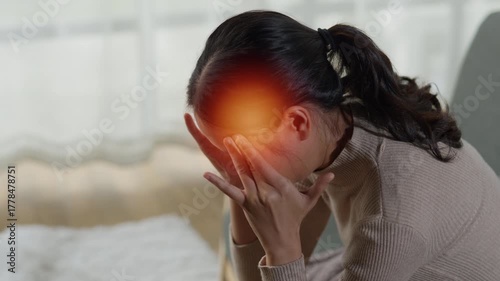 Woman Experiencing Severe Headache at Home Emotional Struggle Indoor Setting Close-Up Perspective Health Awareness
