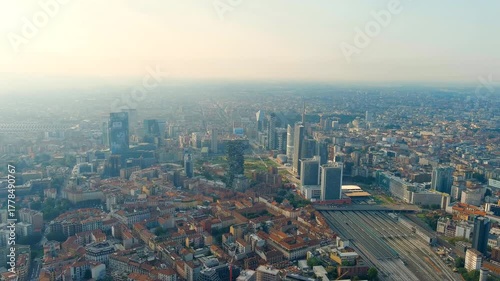 Wallpaper Mural Milan, Italy. The famous skyscrapers of Milan are located around the botanical garden Campo di Fiori BAM. Milano Porta Garibaldi train station. Drone footage Torontodigital.ca