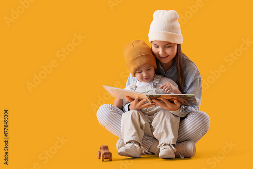 Teenage girl with her littl...