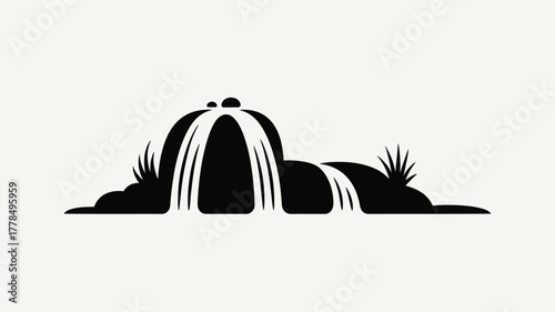 Stylized black silhouette of a waterfall flowing over rocks