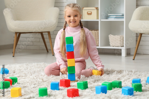 Cute little girl with plast...