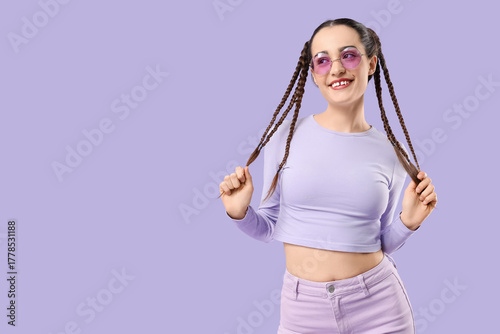 Happy young woman with brai...