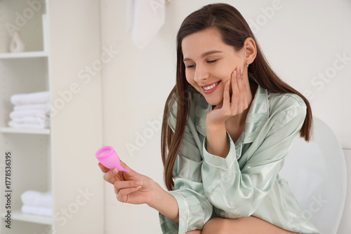 Young woman with menstrual ...