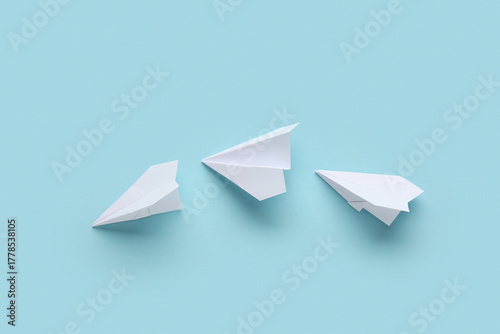 Paper planes on blue backgr...