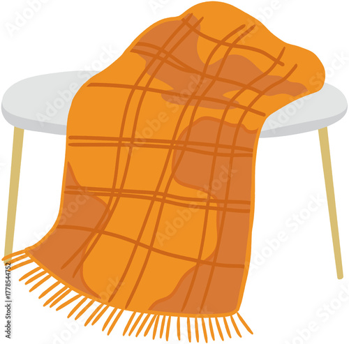 Soft and Vibrant Orange Checkered Throw Blanket Beautifully Displayed on a Modern White Table, Ideal for Creating a Cozy Atmosphere and Enhancing Home Decor