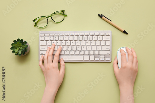 Female hands with computer ...