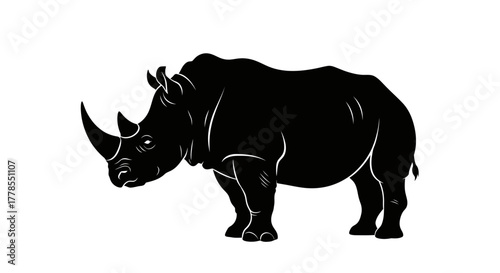 Silhouette of a rhinoceros standing on a white background.