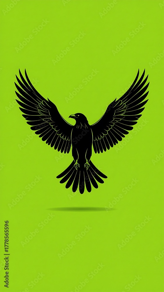 Obraz premium Silhouette of a black bird with spread wings against a green background
