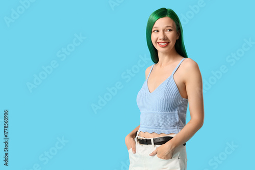 Pretty young woman with gre...