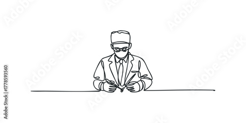 Man in medical attire holding medical instrument