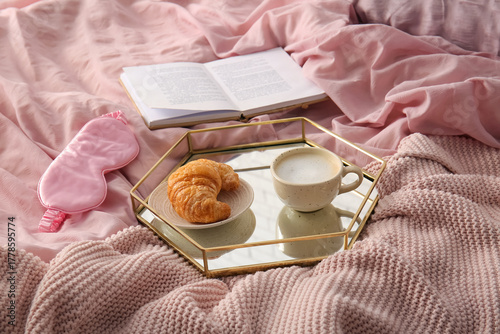 Cup of coffee with croissan...