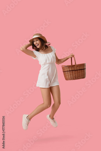 Happy young woman with picn...