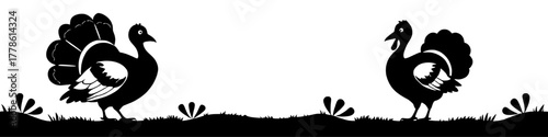 two turkey silhouettes facing each other on a grassy ground