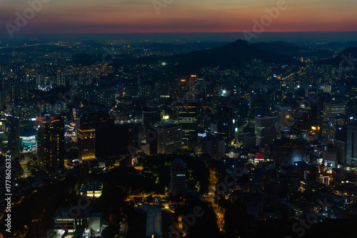 Wallpaper Mural City Skyline View at Dusk With Glowing Lights and Mountains Torontodigital.ca