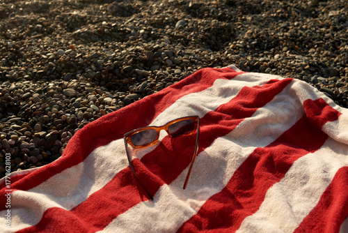 Sunglasses on a beach towel