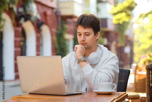 Thoughtful programmer worki...
