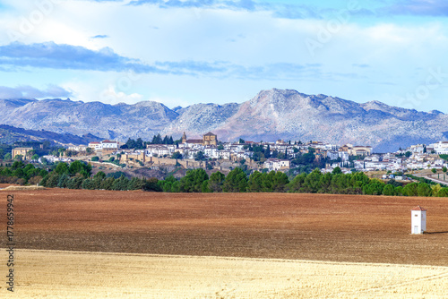Scenic view of the historic ronda village in andalusia, spain, with surrounding mountains and rural fields