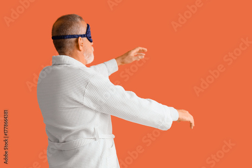 Senior male sleepwalker on ...