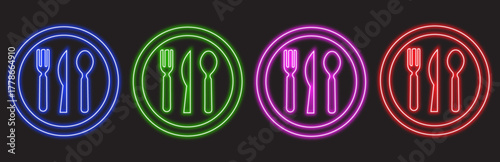 Four neon place settings with cutlery in different colors blue, green, pink, and red, isolated on