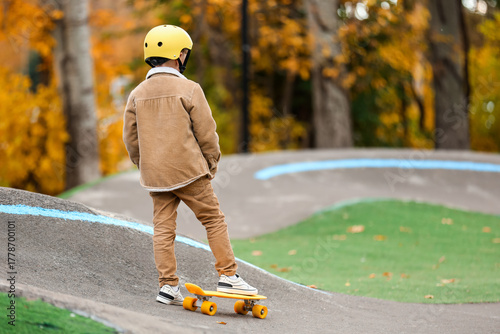 Little boy with helmet and ...