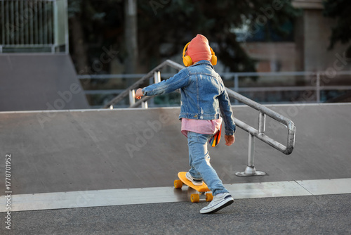 Cool little boy with headph...