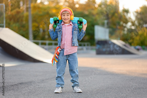 Cool little boy with headph...