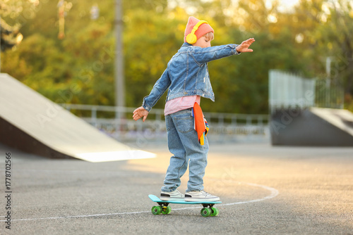 Cool little boy with headph...