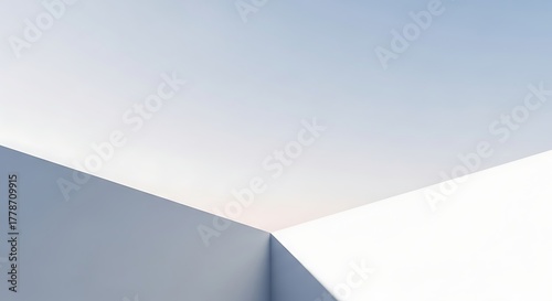 Abstract geometric background with soft pastel blue and white intersecting planes