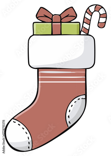 Festive Christmas stocking with a present and candy cane isolated on white background